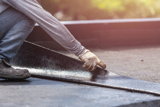 Professional Waterproofing technician working in Hillsboro, IN